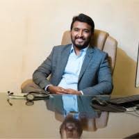 Dr Mohan R